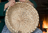 Long strips of white oak are woven into baskets.
