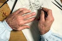 A craftsman begins with a detailed drawing.