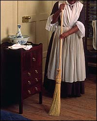 African American woman sweeping