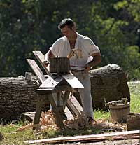 Carpenters constructed houses, tobacco barns, outbuildings, and fences.