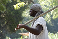 Interpreters recreate the work of the enslaved  at an 18th century plantation.