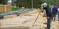 Archaeologist Bill Kelso at Historic Jamestowne uses a laser surveying instrument and a global positioning system to map the dimensions of the 1607 fort.