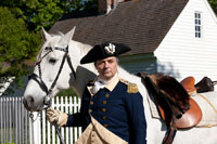 Ron Carnegie as George Washington with his horse