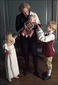 Bill Barker as Thomas Jefferson plays with his “grandchildren.”