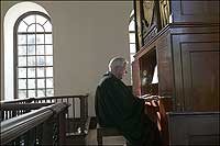 Playing the organ in the Wren Chapel