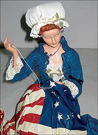 Betsy Ross merchandise runs from dolls to flags, a telling sign that her story—a mixture of fact and folklore—remains part of the national biography.