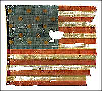 A post-Revolutionary version, this official 1795 flag flew from Fort Henry, inspiring Francis Scott Key’s “Star-Spangled Banner.”