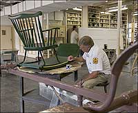 Phil Moore paints a riding chair