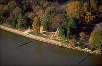 Seen from the air, a statue of John Smith faces out over the prospect of the James River.