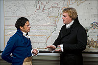 Colonial Williamsburg’s Willie Balderson as Meriwether Lewis discusses with Bill Barker’s Thomas Jefferson the proposed Lewis and Clark expedition to find, among other things, a usable water route through the continent to the Pacific. They did not find it.