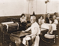 Printers at work in the Bureau of Engraving and Printing in the 1920s.