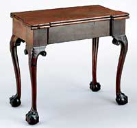 Attributed to the original Anthony Hay Shop on Williamsburg's north side, this card table appears in the late nineteenth-century picture below. Hanx Lorenz