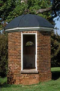One of a pair of octagonal brick privies 