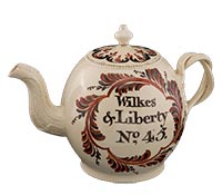 A mid-18th-century creamware teapot celebrates Wilkes and his No. 45 issue of The North Briton.