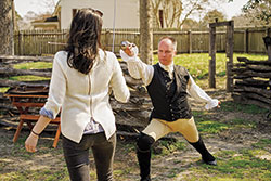 Scott Green, an actor-interpreter, often teaches fencing to guests at the Anderson Blacksmith Shop and Public Armoury.