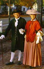 Representing a prosperous gentry couple, Charlie Red and Lisa Kause stroll Duke of Gloucester Street in their "middling sort" finery