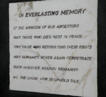 Credit: Photo courtesy Ted Maris-Wolf, 2009 Plaque near the entrance to the courtyard of Elmina Castle