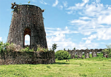 Credit: The Slave Route—Traces of Memory in Guadeloupe Ruins of the windmill tower and sugar complex