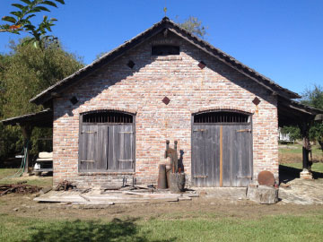 Credit: Whitney Plantation Robin’s Blacksmith Shop, exterior