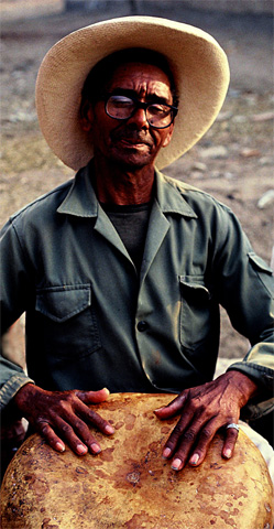 “Tana” musician with “Checo,” or calabash, Zaña, Peru