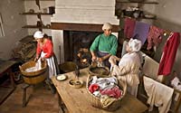 A fire, tubs of hot water, and lines for drying—with a table for ironing—were the eighteenth-century version of a washer and dryer.