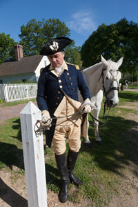 Ron Carnegie as George Washington with his horse