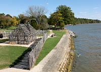 A reinforced shoreline separates Historic Jamestown from the James River. The “barracks” are just feet away.