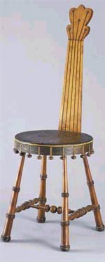 Made in New Hampshire during the 1920s, the Banjo Chair can be found in the Abby Aldrich Rockefeller FolkArt Museum