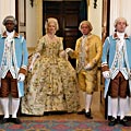 2002 - Lord and Lady Dunmore enter palace supper room with liveried servants