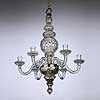 This lead-glass chandelier, or "lustre" in period parlance, was made in England about 1730. Nearly 30 inches tall, it has been installed in the Council Chamber at the Capitol, where a similar fixture hung in the 18th century. Fragile and costly, glass lighting devices were luxuries and appeared in only the most elevated of colonial American buildings. The Council Chamber, used for meetings of the governor and his councilors - a group analogous to the upper house of today's state legislature - was a richly appointed space, befitting the occupants' lofty rank. Similar chandeliers survive in situ at important historic sites in England, including Emanuel College, Cambridge, and Grimsthorpe Castle, Lincolnshire. Virginia's councilors evidently considered themselves worthy of such niceties; they agreed to purchase two glass chandeliers for use in and adjacent to their chamber.