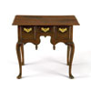  Made about the middle of the eighteenth century in Norfolk, Virginia, an Atlantic port, this shapely dressing table descended in the Talbot family. Unlike most coastal southern furniture, which reflects British cabinetmaking traditions, the design and construction parallel New England conventions. Were it not for the table's Tidewater history and its execution in Virginia black walnut black walnut, yellow pine, and white cedar, it could be convincingly ascribed to the Connecticut River Valley, where remarkably similar tables were produced. There is little doubt that this table's maker migrated from that part of New England to the lower Chesapeake Bay. The table is on view at Colonial Williamsburg's DeWitt Wallace Decorative Arts Museum. The Sara and Fred Hoyt Furniture Fund underwrote its acquisition.
     